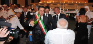 Giulio Marini brinda con i facchini: era il 2012